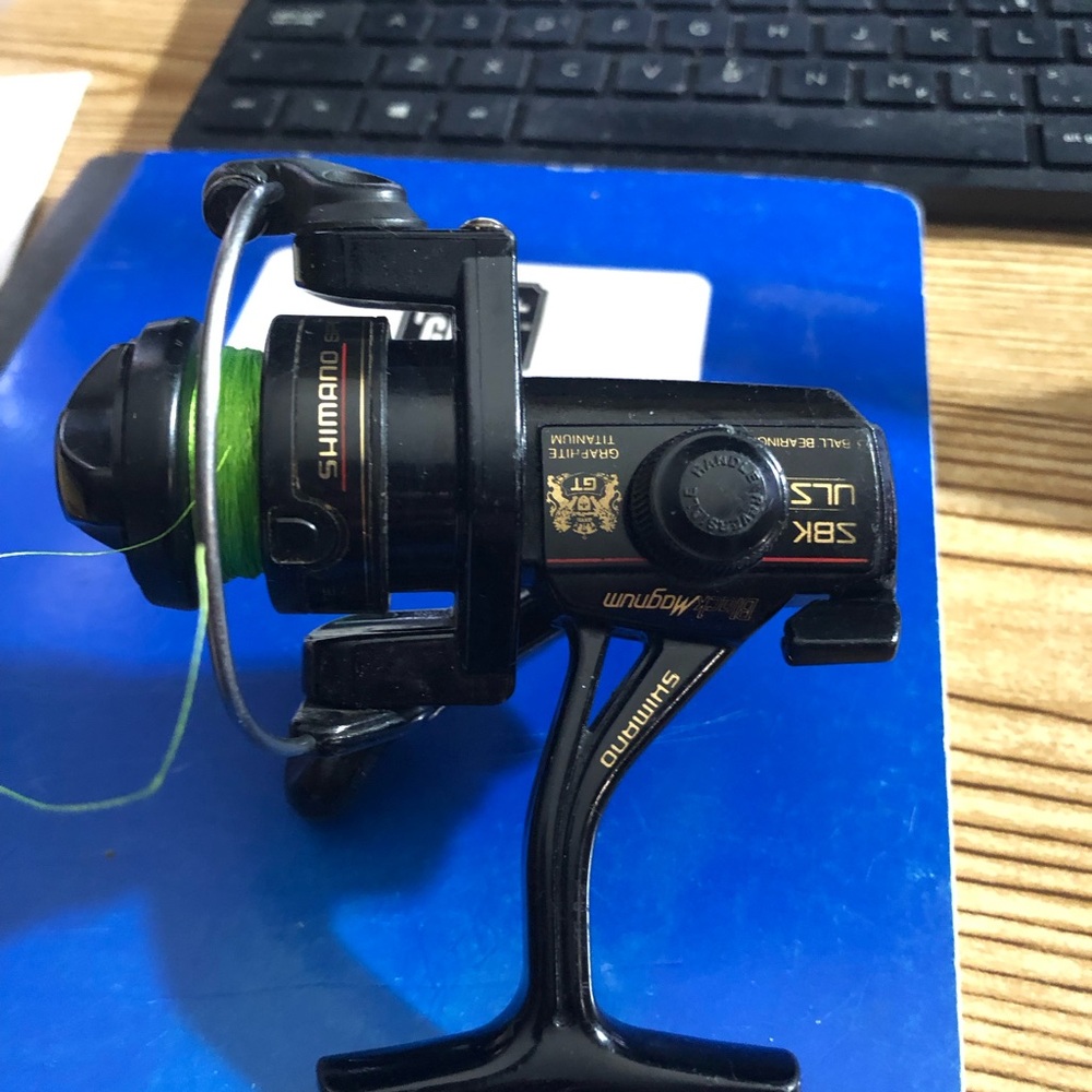 Shimano Magnum SBK ULS 3 Ball Bearings Black Reel with Green Line